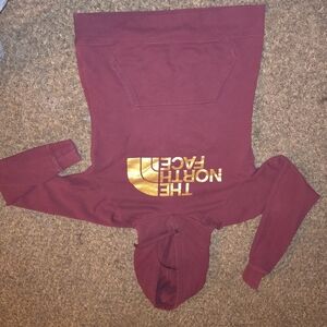 The North Face Burgundy Hoodie with Gold Emblem